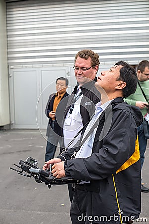 Visitor with remote controller Editorial Stock Photo