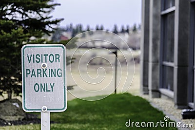 Visitor Reservered parking sign in Office Car Lot Stock Photo