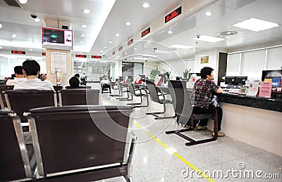 Visitors in bank office Editorial Stock Photo