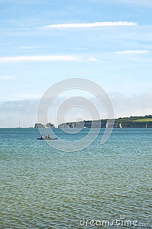 Visitors enjoy leisure activities around well known Studland Bay Beach Editorial Stock Photo