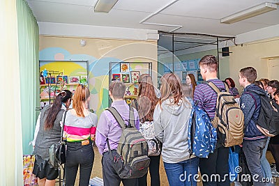 Visitors at the Exhibition of works by students at the College of the city of Chapaevsk Editorial Stock Photo