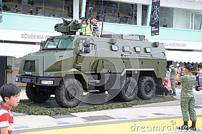 Visitors exploring the Renault Higuard protected Response Vehicle at Army Open House 2017 in Singapore. Editorial Stock Photo