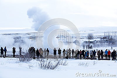 Visitors at the geyser erruption of Strokkur, Iceland Editorial Stock Photo