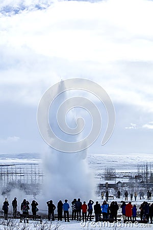 Visitors at the geyser eruption of Strokkur, Iceland Editorial Stock Photo