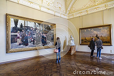 Visitors in the hall of the Russian artist Konstantin Savitsky and Grigory Myasoedovn in the Russian Museum, St. Petersburg Editorial Stock Photo