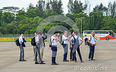 Visitors looking at military aircrafts Editorial Stock Photo