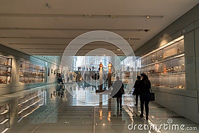 ATHENS, GREECE - MARCH 06, 2018: Visitors at the New Acropolis Museum in Athens. Designed by the Swiss-French Architect Bernard Editorial Stock Photo