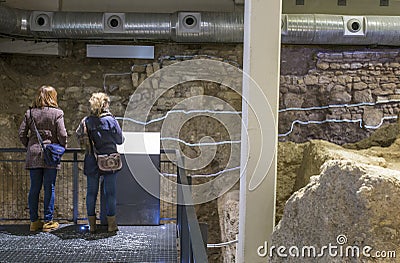 Visitors at Roman theatre remains inside Archaeological Museum of Cordoba, Spain Editorial Stock Photo