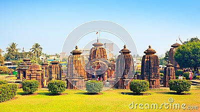 Visitors studying beautyful Mukteshvara Temple - 10th century hindu temple in Bhubaneswar Editorial Stock Photo