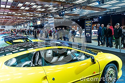 Visitors view the presented cars at Canadian International Auto Show Editorial Stock Photo