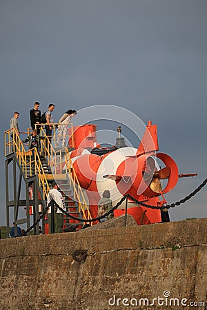 Visitors are viewin old deep-submergence rescue vehicle AS-22 on the shore on a cloudy day Editorial Stock Photo