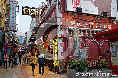 Visitors visit the famous souvenir street in Macau Editorial Stock Photo