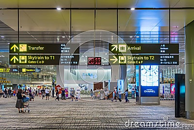 Visitors walk around Departure Hall in Changi Airport Singapore Editorial Stock Photo