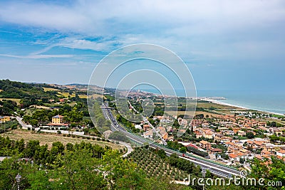 Vista from Torre di Palme to the villages of Marina Palmense and Santa Maria a Mare, over the E55 highway in Marche region in Stock Photo