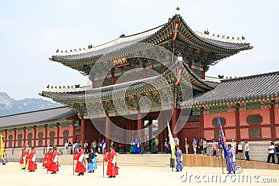 Vistiors waiting for the ceremony to change the guards at the Gyeongbokgung Palace Editorial Stock Photo