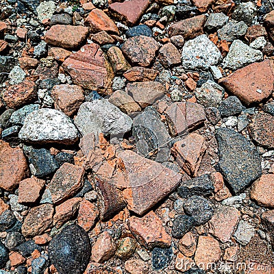 A Scattered Collection of Rocks and Gravel on the Ground Stock Photo