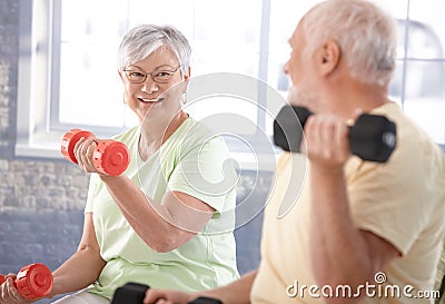 Vital senior couple in the gym Stock Photo