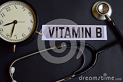 Vitamin B on the paper with Healthcare Concept Inspiration. alarm clock, Black stethoscope. Stock Photo