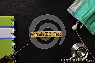 Vitamin B12 - Test on top view black table with blood sample and Healthcare/medical concept Stock Photo