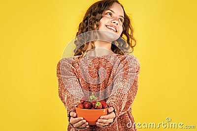 Vitamin concept. Summer berries. Child eating strawberry. Grocery store. Strawberries safest fruit for sugar levels Stock Photo