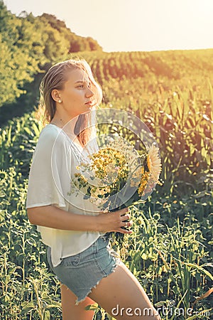 Vitamin D in Womens Health, Role of Vitamin D3 Supplements in female health. Young woman enjoying sun in nature Stock Photo