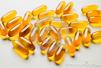 Vitamin e. Fish oil capsules on white background. Copy space for Stock Photo