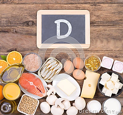 Vitamine D food sources, top view on wooden background Stock Photo