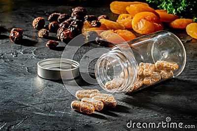 Vitamins, dietary supplements, drugs, tablets pils and capsules Stock Photo