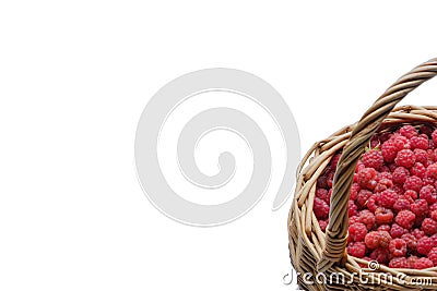 Vitamins in raspberries, ripe red raspberries in a wicker basket isolated on a white background. place for advertising and text, m Stock Photo