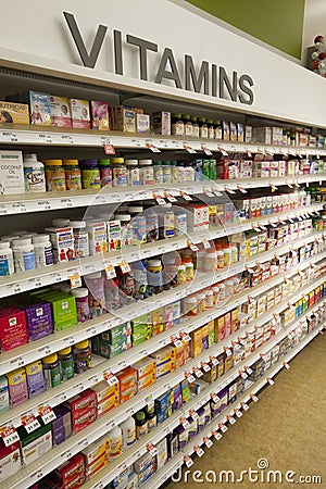 Vitamins, shop shelves. Pharmaceutical products Editorial Stock Photo