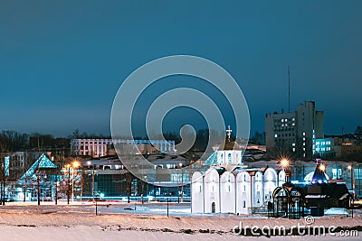 Vitebsk, Belarus. Winter View Of Church Of Annunciation And Wooden Church Of St. Alexander Nevsky In Night Illuminations Stock Photo