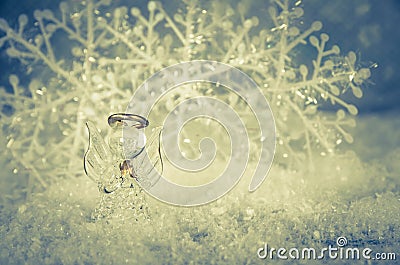 vitreous angel and simple white snowflake decoration Stock Photo