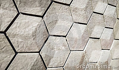 vitrified tiles in a hexagonal geometrical pattern with grey and white texture Stock Photo