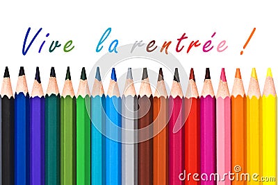 Vive la rentree (meaning Back to school) written on white background with colorful wooden pencils Stock Photo