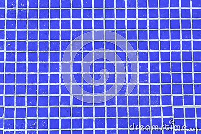 Vivid dark blue background texture of tile mosaic swimming pool Stock Photo