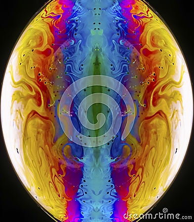 Vivid rainbow colours of a Macro soap bubbles creating psychedelic patterns under light dome Stock Photo