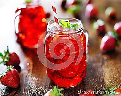 Vivid red strawberry cocktail in a jar Stock Photo