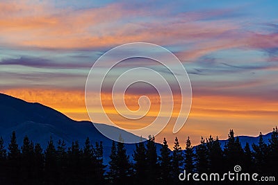 Vivid sunset colors over Canterbury Hills, New Zealand Stock Photo