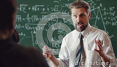 Vivid teacher explaining math theme Stock Photo
