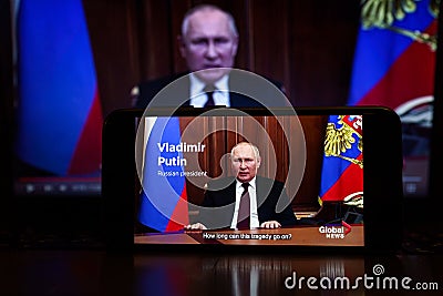 Vladimir Putin on the news. President of Russian speech on TV. Russia and Ukraine war Editorial Stock Photo