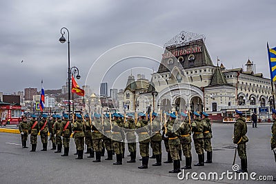 The Russian soldiers in front of Vladivostok Railway station before North Korea leader Kim Jong Un's visit to Russia. Editorial Stock Photo