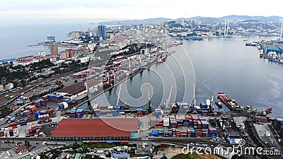 Vladivostok, Russia - August 9, 2021: Top view. Commercial Sea Port. Industrial port with containers. Editorial Stock Photo