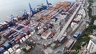 Vladivostok, Russia - August 9, 2021: Top view. Commercial Sea Port. Industrial port with containers. Editorial Stock Photo