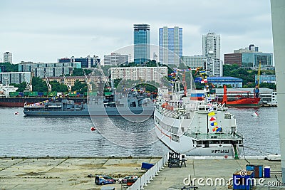 Warships on the background of the urban landscape Editorial Stock Photo
