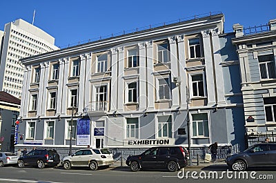 Vladivostok, Russia, October, 25,2017. Cars are near the building of Local organization of all-Russian creative public organizati Editorial Stock Photo