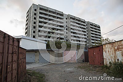 VLADIVOSTOK, RUSSIA - 03/09/2021 a soviet empty abandoned unfinished haunted residential concrete panel house building Stock Photo