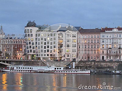 Vltava river, dancing house and Prague from the deck of a pleasure boat, Czech Republic. Editorial Stock Photo