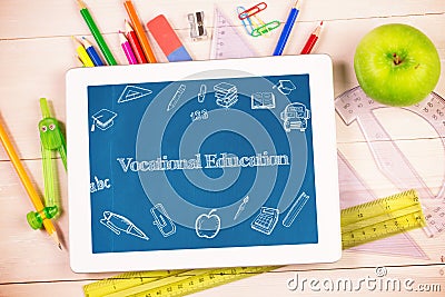 Vocational education against students desk with tablet pc Stock Photo