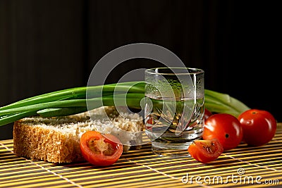 Vodka vegetables still life on the mat home russian style Stock Photo