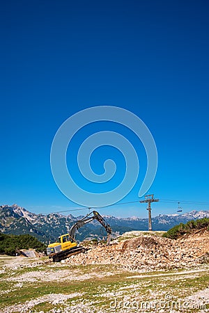 Construction machinery for crushing stone Editorial Stock Photo